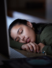 Image showing Exhausted, night and a business woman sleeping at her desk while working overtime in her office. Burnout, deadline and tired with a female employee asleep in the workplace during the late shift