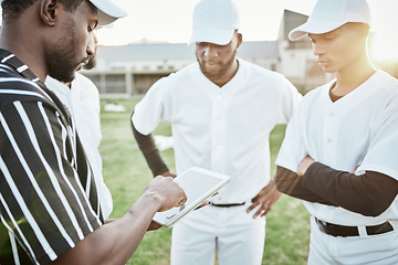 Image showing Fitness, team and black man with coach, tablet and planning for training, competition and workout for wellness. Exercise, Nigerian male trainer and players on field, device and conversation for game