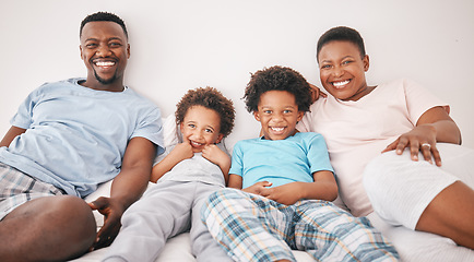 Image showing Black family, smile and portrait of parents with children on bed for bonding, quality time and relax together. Love, happy and African mom, dad and kids in bedroom enjoy morning, weekend and holiday