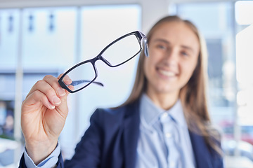 Image showing Optometry, eyesight and portrait of woman with spectacles with prescription lens after eye test. Healthcare, vision and female patient or customer holding glasses frame for eye care in optical store