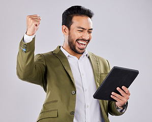 Image showing Asian man, tablet or success fist on isolated studio background for financial growth, stock market deal or future security. Smile, happy or cheering businessman with winner hands, technology or loan