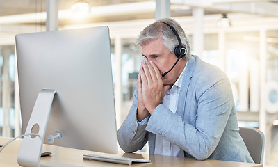 Image showing Call center, customer service and anxiety with a consultant man suffering from stress while working in the office. Crm, support or burnout with a senior male telemarketing working feeling overwhelmed