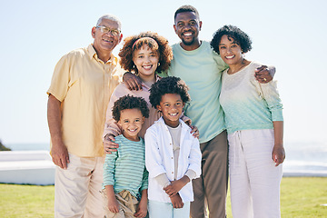 Image showing Love, smile and portrait of a happy family at a beach for travel, vacation and holiday on nature background. Relax, face and trip with children, parents and grandparents bond while traveling in Miami