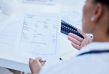 Image showing Paperwork, test and doctor with results on document or paper working in office reading prescription in a hospital. Clinic, medicine and medical healthcare professional or worker with insurance