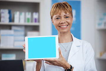 Image showing Pharmacy, pharmacist and woman with tablet green screen for advertising, marketing or mockup space. Healthcare, wellness portrait or happy elderly medical doctor with technology for product placement