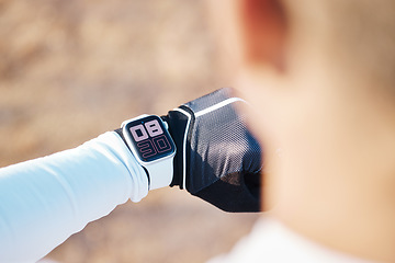 Image showing Watch, active and time on hand of person in a race as a stopwatch during exercise, sports and workout outdoors. Tracking, tracker and smartwatch on male athlete or runner timing his training session