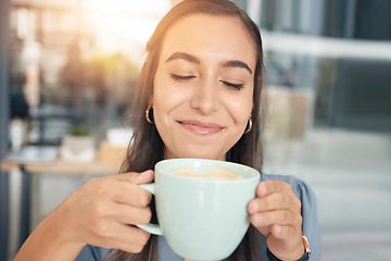 Image showing Business woman, face and drinking coffee in office, company and startup with smile, lunch break and happiness. Happy female worker enjoy cup of tea, cappuccino and latte while relaxing in workplace