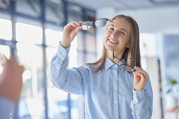 Image showing Glasses, choice and vision with a woman at the optometrist for new prescription frame lenses as a customer. Eyewear, decision and shopping with an attractive young female shopper buying eyeglasses