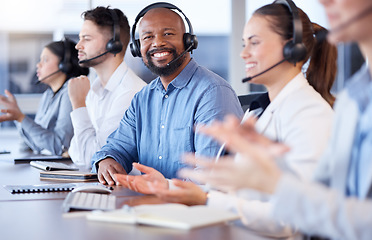 Image showing Contact us, call center or portrait of friendly black man in telecom communications company in help desk. Happy smile, crm or face of sales agent working online in technical or customer support