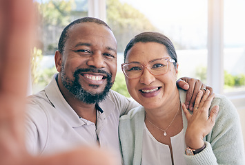 Image showing Happy, mature and portrait of an interracial couple with a selfie for a memory, together and relationship. Smile, love and a black man with a woman taking a photo, looking and joyful at home