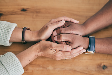 Image showing Closeup of couple holding hands for support, empathy and help with news, depression or mental health problem. Therapy, psychology and depressed, sad or anxiety of mature man and woman hand together
