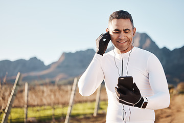 Image showing 5g, earphones and nature, happy man and phone at rest stop in countryside looking at location online with music. Mobile streaming, fitness app and smartphone, cyclist on internet search with smile.