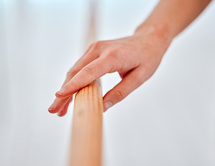 Image showing Ballet, training and hands on barre for exercise, practice or performance in studio. Ballerina, art and creative woman ready to start workout, exercising or dancing for theatre, routine or dance.