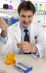 Image showing Scientist or chemist  at work in laboratory