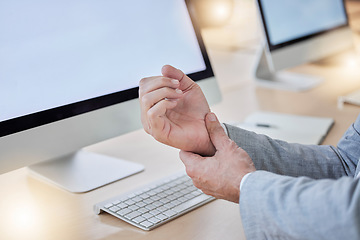 Image showing Hand, arthritis and joint pain with a business man in his office, sitting at a desk suffering from carpal tunnel. Stress, medical or anatomy and a male employee struggling with osteoporosis or injury