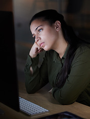 Image showing Burnout, computer and bored woman working at night in office, unhappy and frustrated with internet glitch on dark background. Startup, tired and female at work late for deadline, 404 or boring task