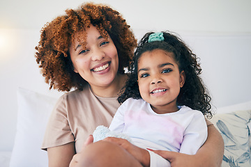 Image showing Portrait, smile and mother and child or kid bonding with care, unity and love spending quality time together. Single parent, daughter and happy mom with little or young girl in a home or house