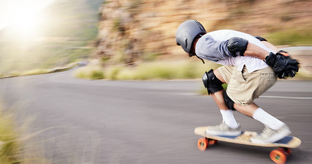 Image showing Skateboard, motion blur and man speed in road for sports competition, training and exercise in city. Skating, skateboarding and male skater for adrenaline, adventure and freedom in extreme challenge