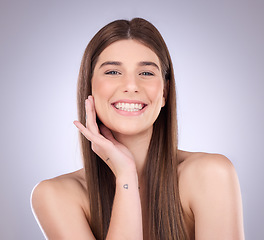 Image showing Face portrait, smile and hair care of a woman in studio isolated on a background. Natural cosmetics, growth and beauty of female model with salon treatment for healthy keratin, balayage and hairstyle