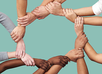 Image showing People, diversity and hands together in teamwork collaboration for trust against a studio background. Diverse group holding hand in unity or solidarity for community or agreement in circle on mockup