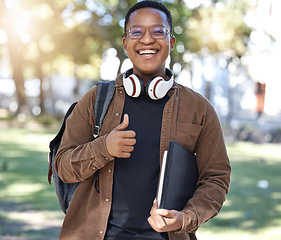 Image showing Student, portrait or thumbs up on campus, park nature or garden in college review, university like or school vote. Smile, happy or black person and thumb hands in learning success or education growth