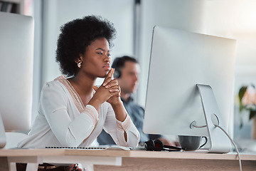 Image showing Thinking, focus or black woman on computer in office for online project, proposal or planning digital ideas. Concentration or thoughtful worker working on pc for internet, network or website research