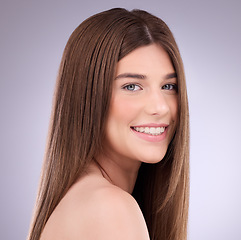Image showing Face portrait, beauty and hair care of woman in studio isolated on a gray background. Makeup cosmetics, skincare and happy female model with salon treatment for healthy keratin, balayage or hairstyle