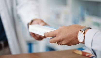 Image showing Closeup, hands and prescription with customer, pharmacist and medicine in drug store. Zoom, hand and medication in clinic, pills and pharmacy for medical antibiotics product, healthcare and wellness