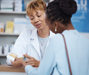 Image showing Healthcare, advice and black woman with pharmacist at counter for help on safe medicine and prescription drugs. Health, pharmaceutical info and patient consulting medical professional at pharmacy.