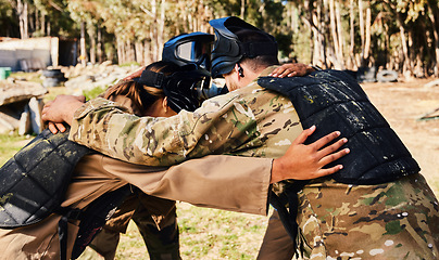 Image showing Group, paintball or team in huddle planning strategy goals, or soldier training on war battlefield together. Community or army soldiers talking for support, collaboration or military people game