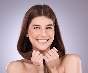 Image showing Face portrait, smile and hair care of a woman in studio isolated on a background. Cosmetics, growth and beauty of female model with salon treatment for healthy keratin, balayage and lone hairstyle.