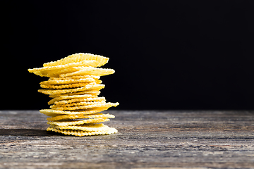 Image showing chips on a wooden table