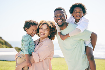 Image showing Happy, love and portrait of a black family at a beach for travel, vacation and piggyback on nature in summer. Smile, face and trip with children and parents embrace and bond while traveling in Miami