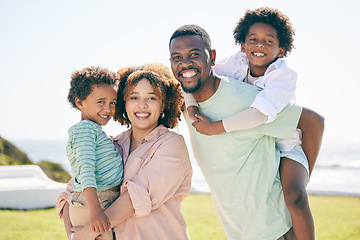 Image showing Happy, smile and portrait of a black family at beach for travel, vacation and piggyback on nature background. Relax, face and trip with children and parents embrace and bond while traveling in Miami