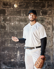 Image showing Baseball, sports and portrait of man with ball on wall background ready for game, match and practice. Softball mockup, motivation and male player in dugout for training, exercise and competition