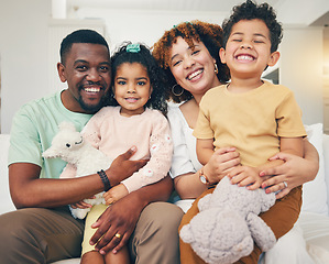 Image showing Black family, home portrait and living room sofa of mama, father and children with happiness. Happy, smile and bonding of a mom, dad and young kids together having fun with parent love and support