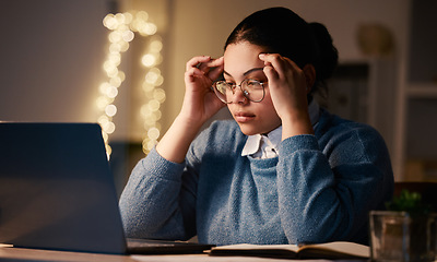 Image showing Latino woman, headache and online stress at laptop of a student with learning burnout. Night, online university project and anxiety of a young female with glasses and blurred background in the dark