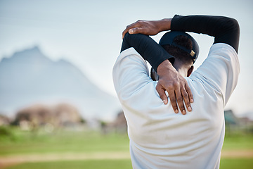 Image showing Baseball field, back view or black man stretching in training ready for match on field in summer. Workout exercise, fitness mindset or focused young sports player in warm up to start playing softball