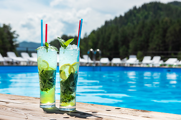 Image showing Two Mojito cocktail with lime and mint in highball glass