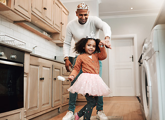 Image showing Happy, portrait and girl and father dancing in the kitchen for celebration, party and bonding. Smile, laughing and dad doing a dance with a child for quality time, happiness and playful together