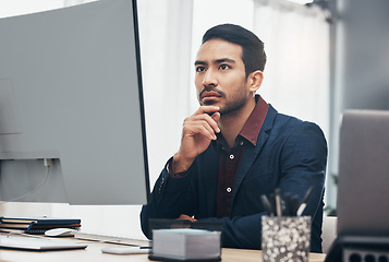 Image showing Business, concentration and man at computer thinking or brainstorming ideas for online project. Planning, analytics and Indian businessman, internet search for startup idea sitting at desk in office.