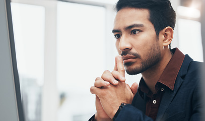 Image showing Office, thinking and face of man at computer, concentration or brainstorming ideas for online project. Planning, analytics and Indian businessman on internet search for startup business idea at desk.