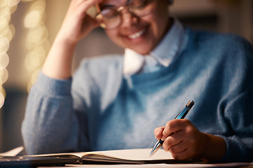 Image showing Business student, notebook or writing in night home office for scholarship finance, planning studying or education loan investment. Smile, happy or working late woman on learning accounting balance