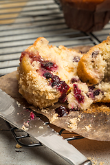 Image showing Muffins with red fruits jam fill.