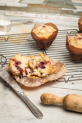 Image showing Muffins with red fruits jam fill.