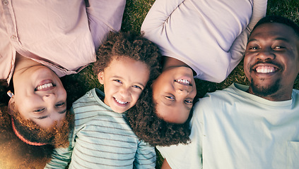 Image showing Smile, black family lying on grass from above and happy face of mom, dad and children together. Weekend, relax and people in garden, top view of woman, man and kids with happiness and love in Africa.