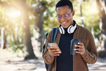 Image showing Social media, park and black man with a phone and coffee for communication, connection and chat. Email, smile and African student reading a notification on a mobile app with a drink on a campus