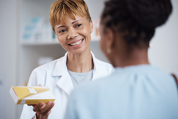 Image showing Pharmacy, pharmacist and woman with medicine for customer, pills or box in drugstore. Healthcare, smile or happy medical doctor with prescription medication, drugs or vitamins, supplements or product