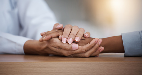 Image showing Hope, black woman or doctor holding hands in hospital consulting for medical test news or results for sympathy. Empathy, sad or zoom of nurse in healthcare clinic nursing or helping sick patient