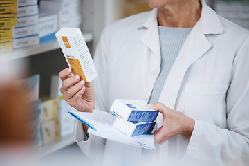 Image showing Pharmacy, pharmacist and hands with medicine, pills or box in drugstore or shop. Healthcare, wellness and medical doctor, female or woman holding medication, product or drugs, vitamins or supplements